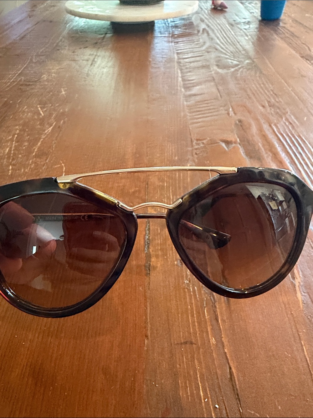 Prada Women’s Tortoiseshell Frame Sunglasses with Gold Arms and Brown Lenses - Picture 2 of 3